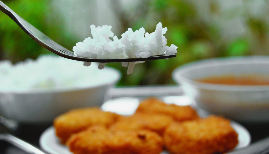 white rice on a fork