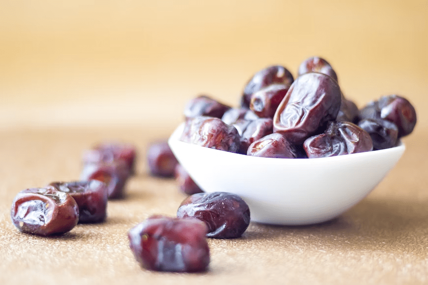 dates in a white bowl