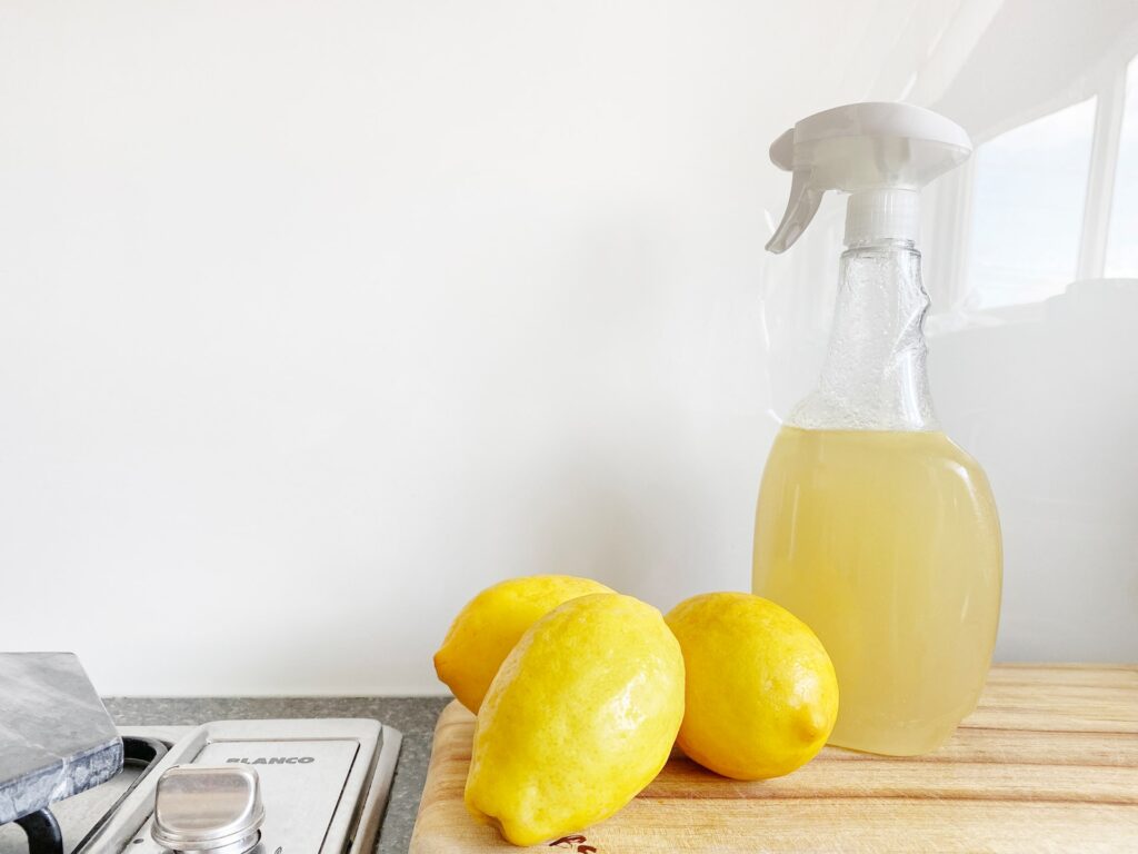 natural cleaning products, lemons on a chopping board