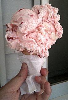 cherry ice cream in a cone